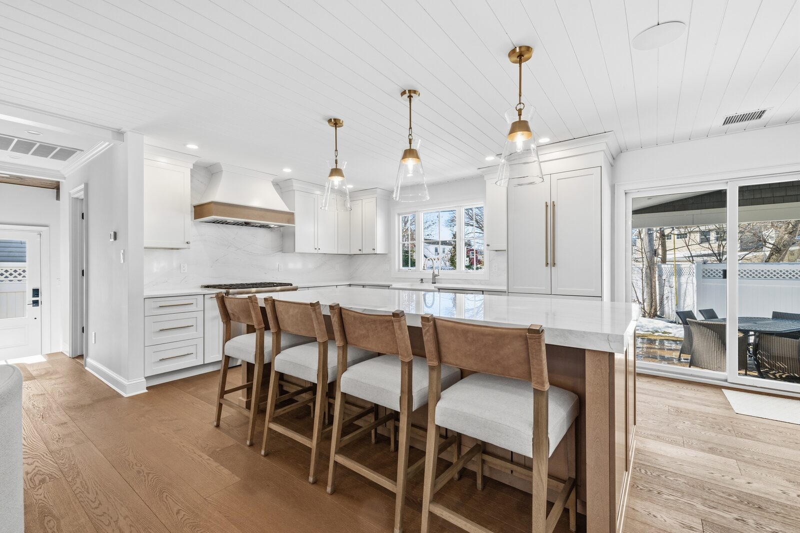 Renovated kitchen with custom cabinetry, view 002