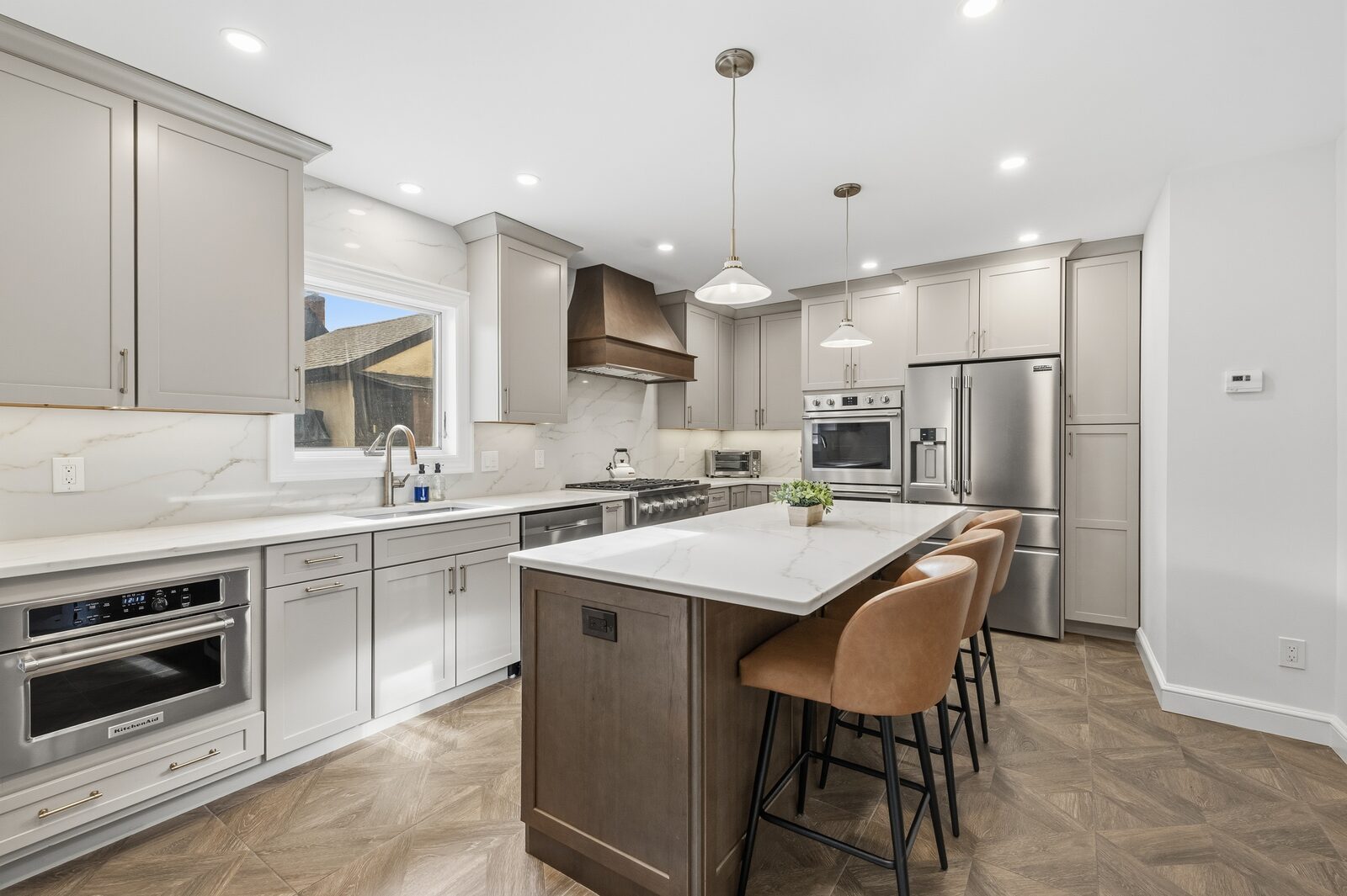 Renovated kitchen with custom cabinetry, view 003