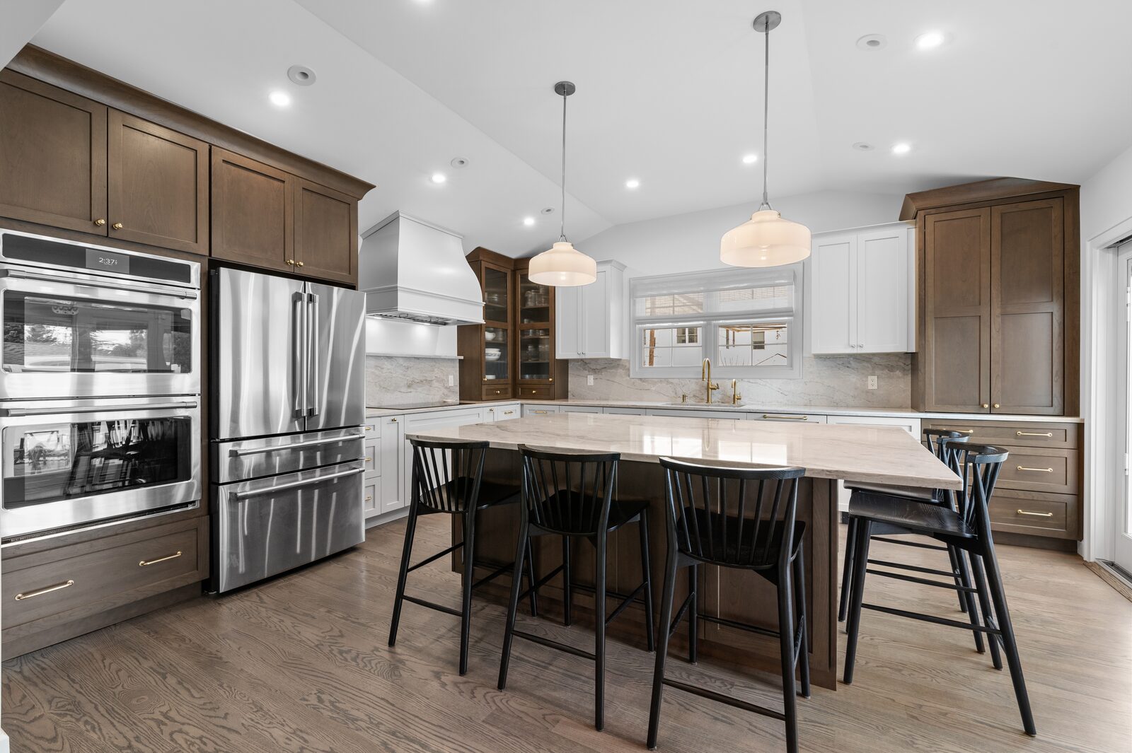 Renovated kitchen with custom cabinetry, view 004
