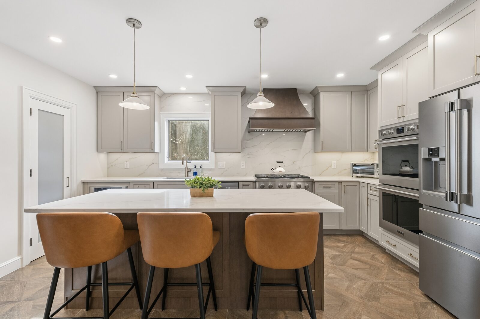 Renovated kitchen with custom cabinetry, view 010