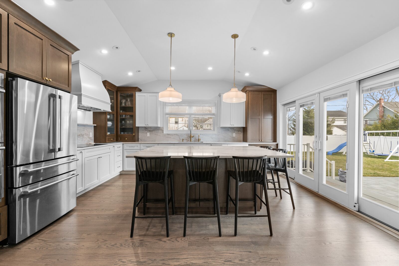 Renovated kitchen with custom cabinetry, view 011