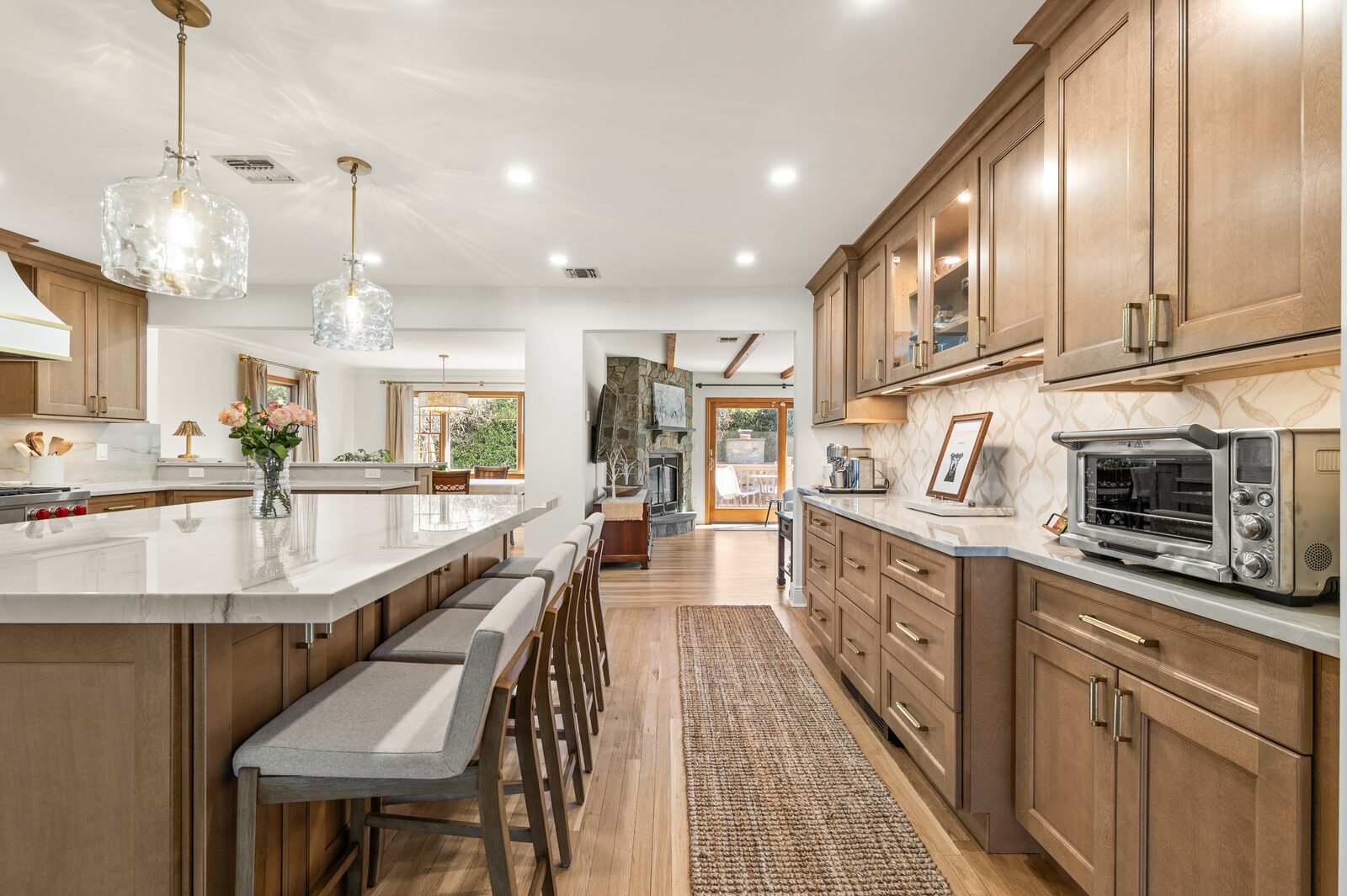 Renovated kitchen with custom cabinetry, view 012