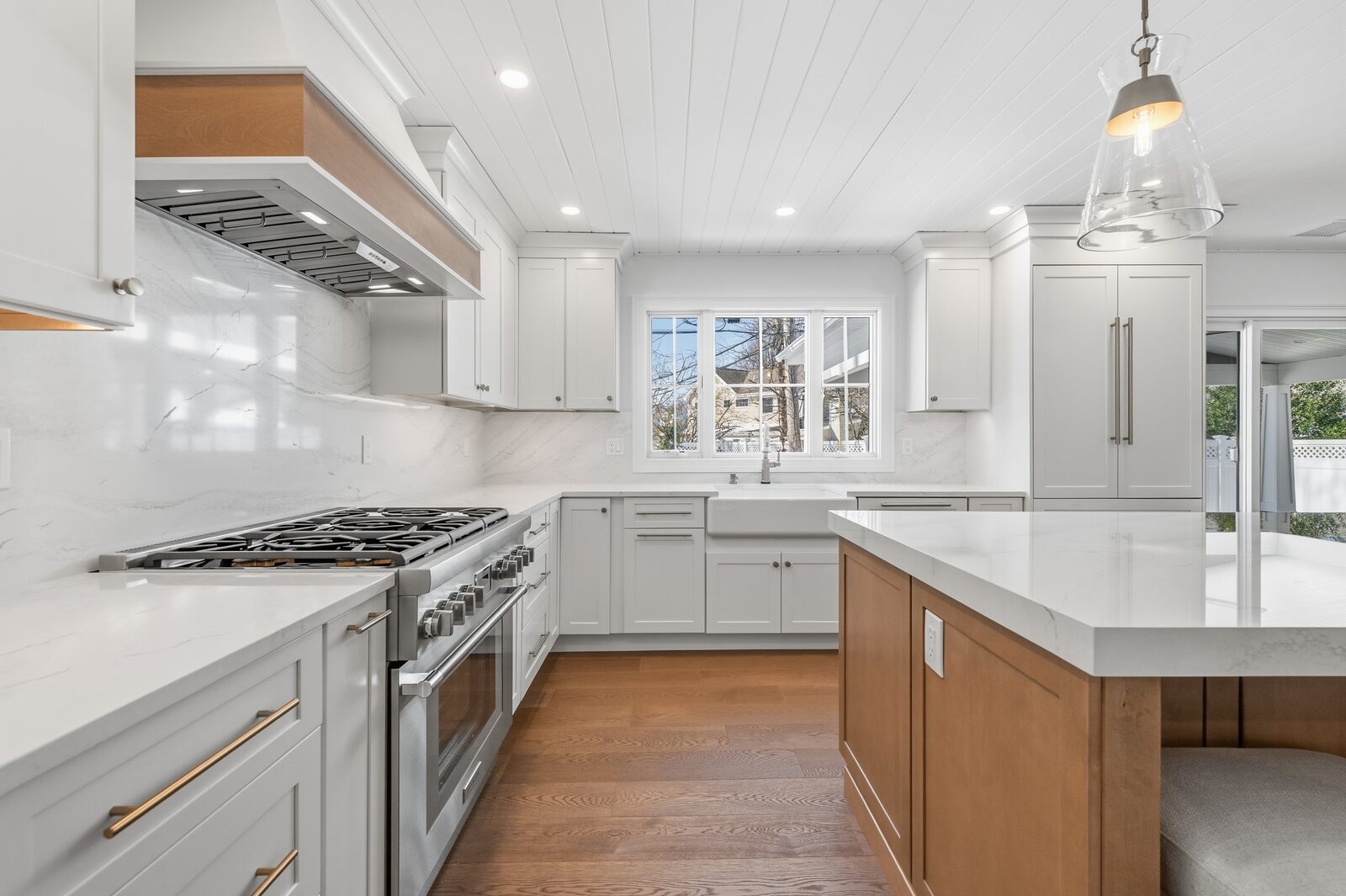 Renovated kitchen with custom cabinetry, view 015
