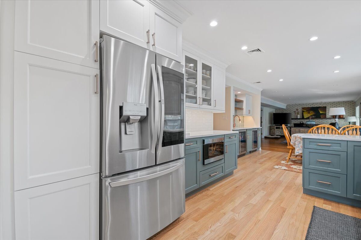 Renovated kitchen with custom cabinetry, view 027