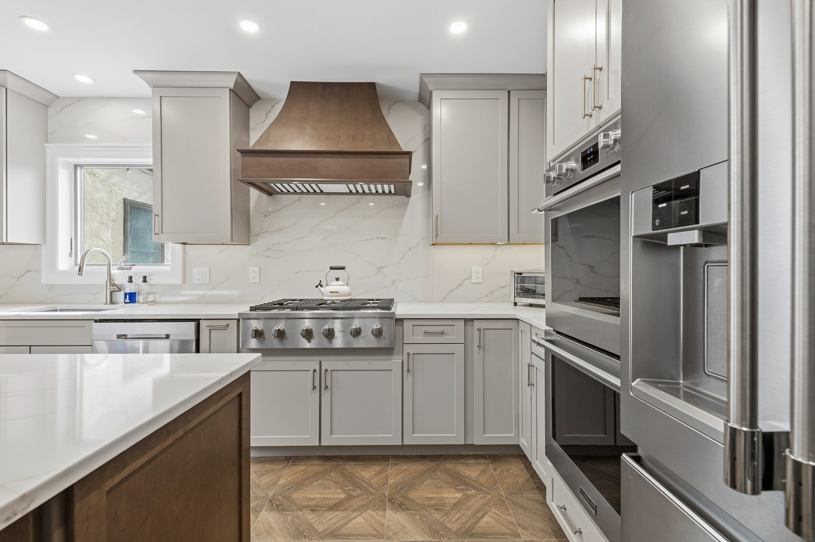 Renovated kitchen with custom cabinetry, view 031