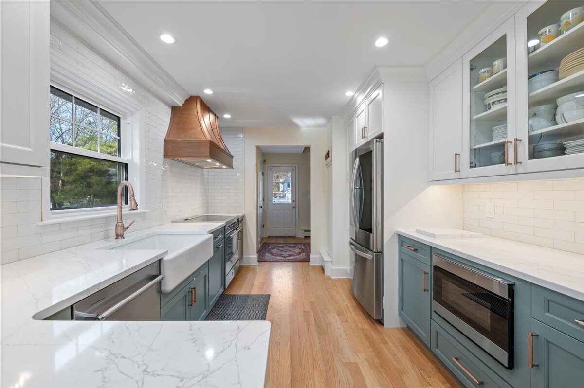 Renovated kitchen with custom cabinetry, view 048