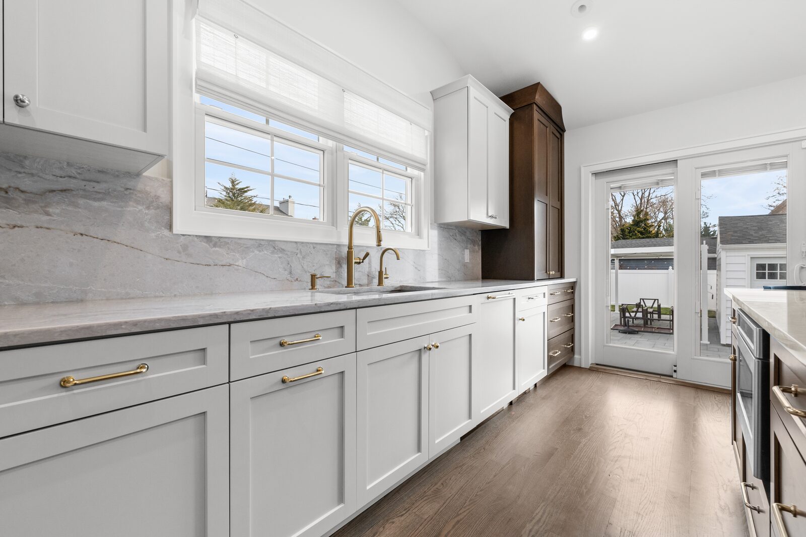 Renovated kitchen with custom cabinetry, view 057
