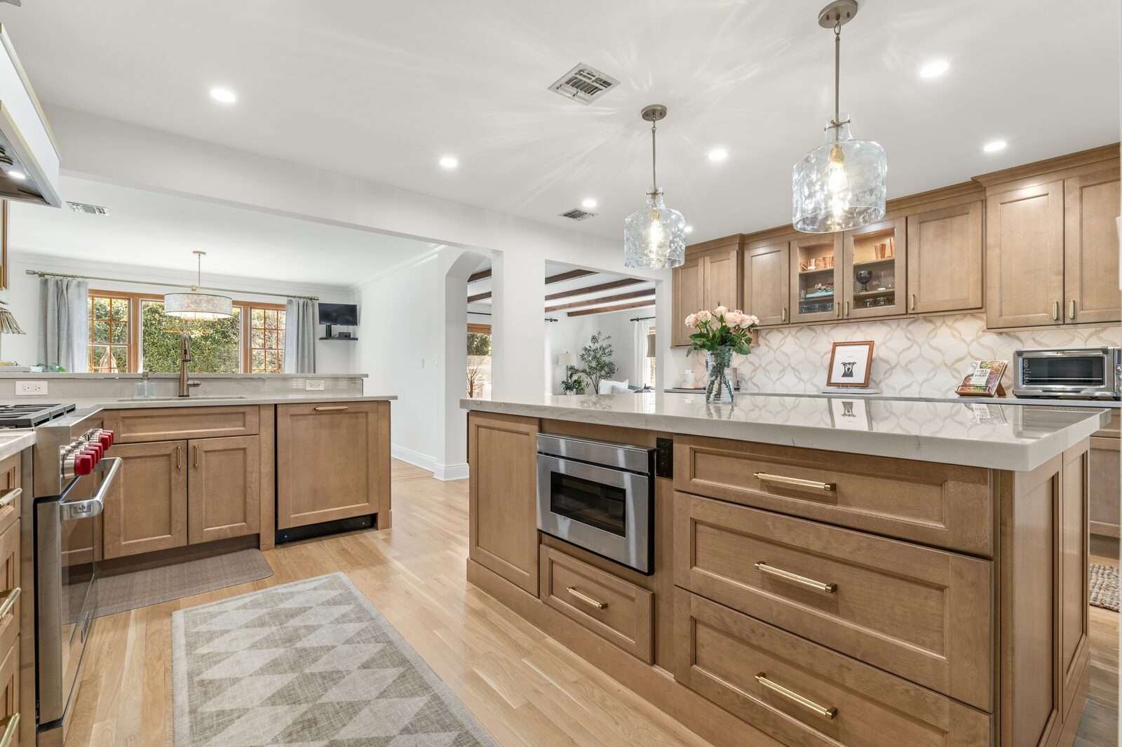 Renovated kitchen with custom cabinetry, view 058