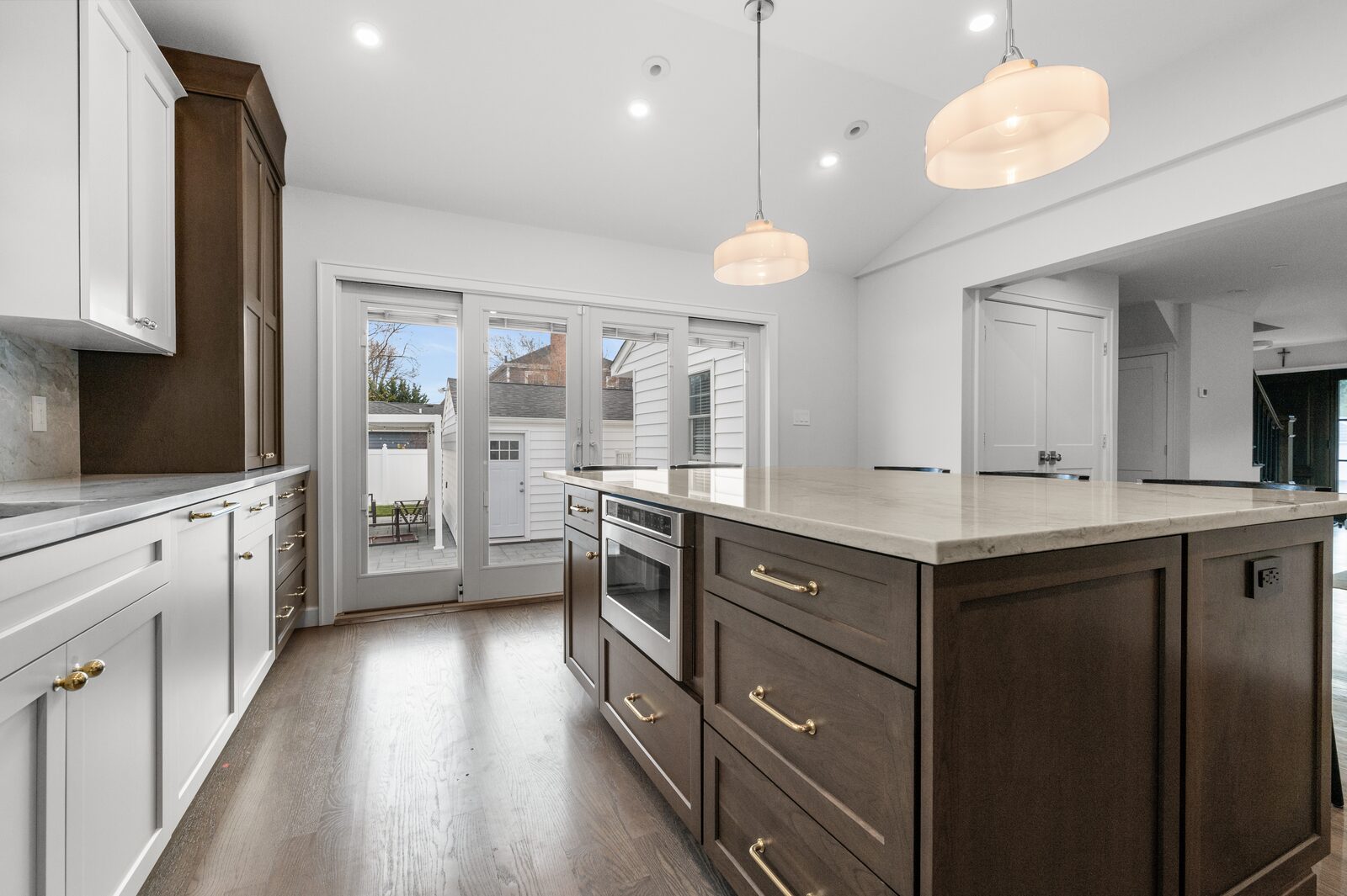 Renovated kitchen with custom cabinetry, view 061