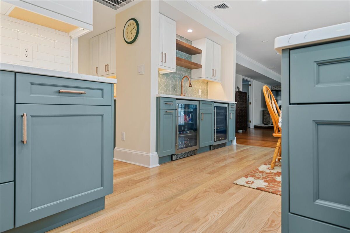 Renovated kitchen with custom cabinetry, view 078