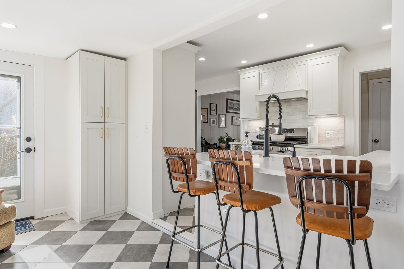Renovated kitchen with custom cabinetry, view 079