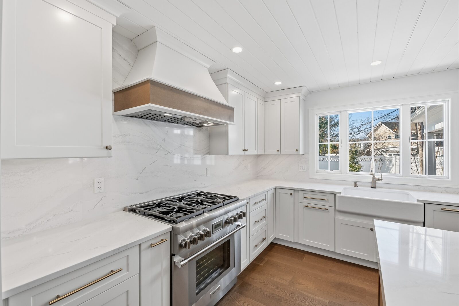 Renovated kitchen with custom cabinetry, view 081