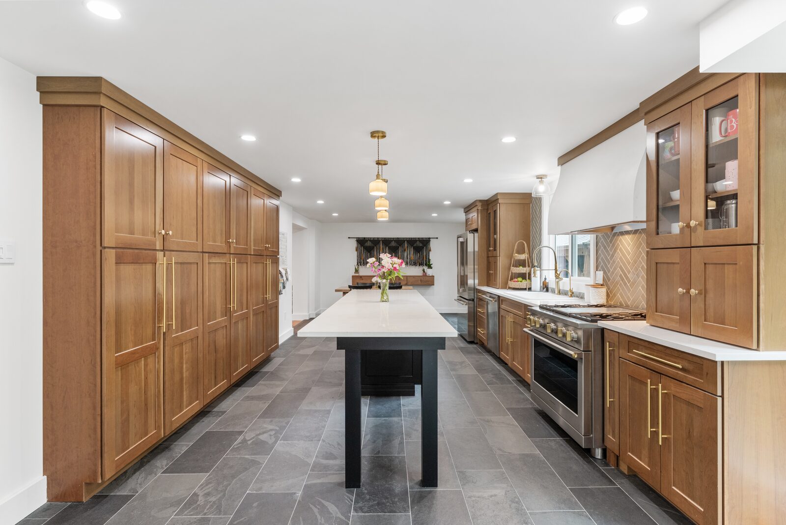 Renovated kitchen with custom cabinetry, view 096