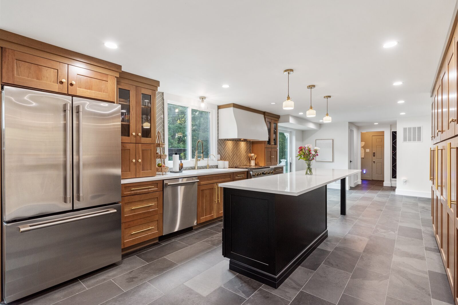 Renovated kitchen with custom cabinetry, view 097