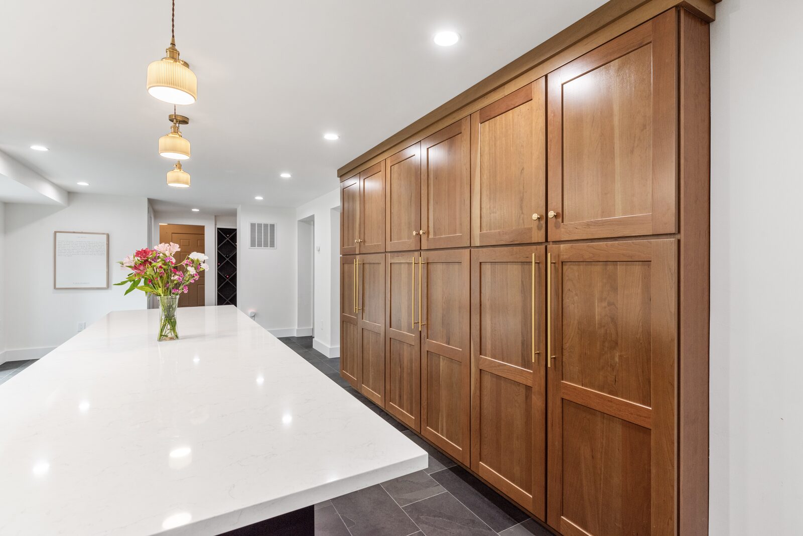 Renovated kitchen with custom cabinetry, view 099