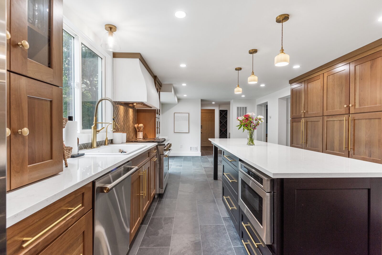 Renovated kitchen with custom cabinetry, view 100